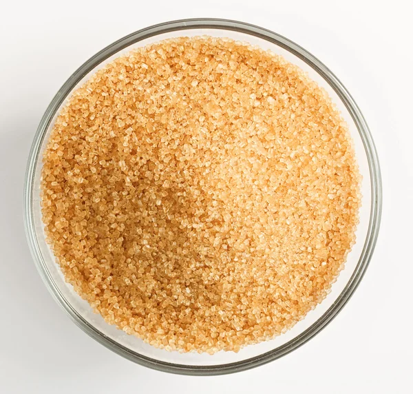 Cane sugar in a glass bowl — Stock Photo, Image