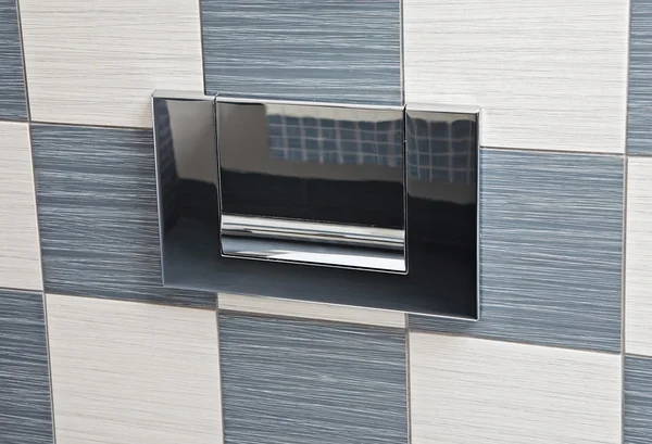 Modern metal toilet lever — Stock Photo, Image