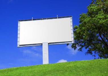 Empty billboard against a beautiful land clipart