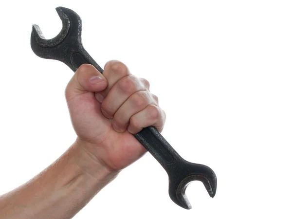 Spanner in hand — Stock Photo, Image
