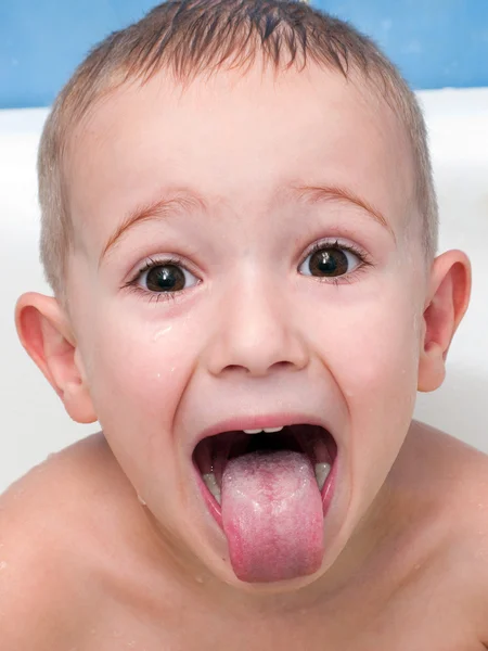 Kleine kind tong — Stockfoto