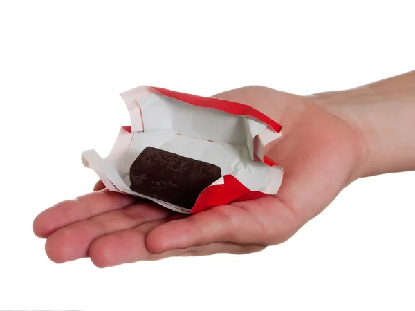 Süßigkeiten in der Hand — Stockfoto