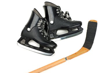 Skates and stick clipart