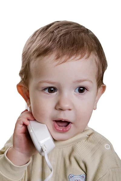 Ребёнок с телефоном — стоковое фото