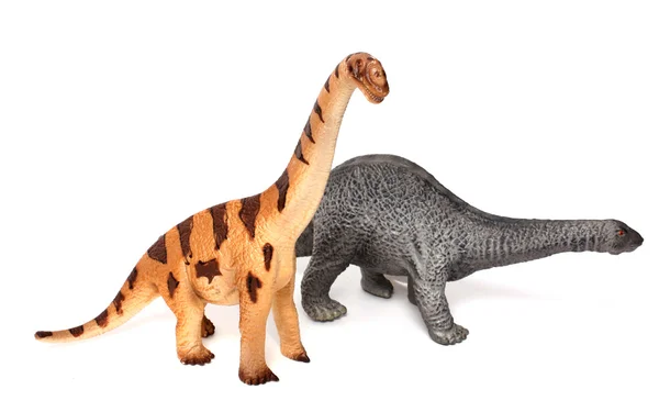 Игрушки динозавров, изолированные на белом — стоковое фото