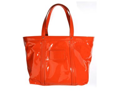 Orange leather bag isolated on white clipart