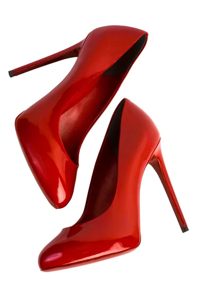 Rote Damenschuhe mit Clipping-Pfad. Stockfoto