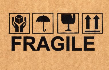 Fragile symbol on cardboard clipart