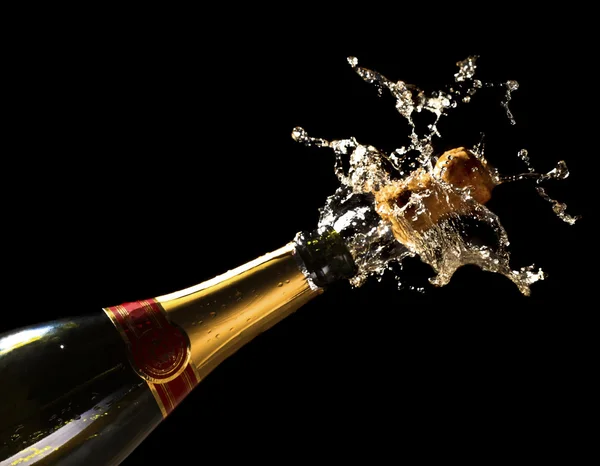 Butelka szampana z korkiem strzelającym — Zdjęcie stockowe