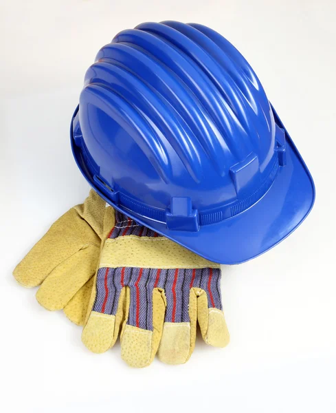 Helmet and gloves background — Stock Photo, Image