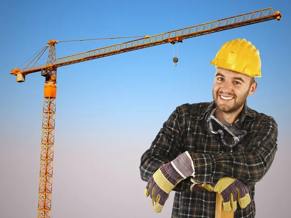 Manual worker with crane background — Stock Photo, Image