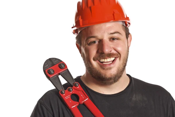 Handyman sorriso e ferramenta — Fotografia de Stock