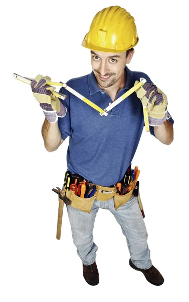 Handyman com medidor — Fotografia de Stock