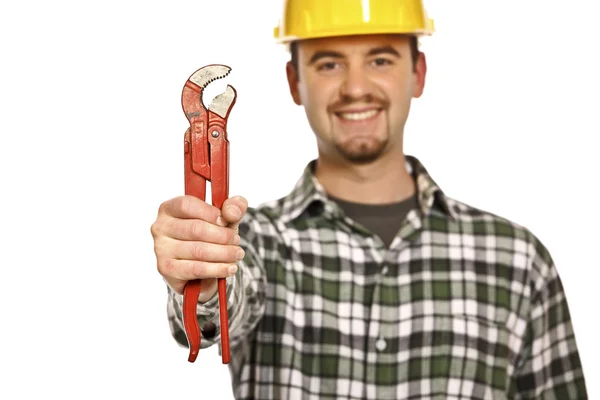 Gelukkig werknemer met rode moersleutel — Stockfoto