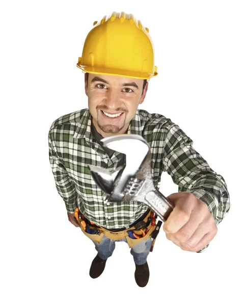 Handyman smile and hold wrench — Stock Photo, Image