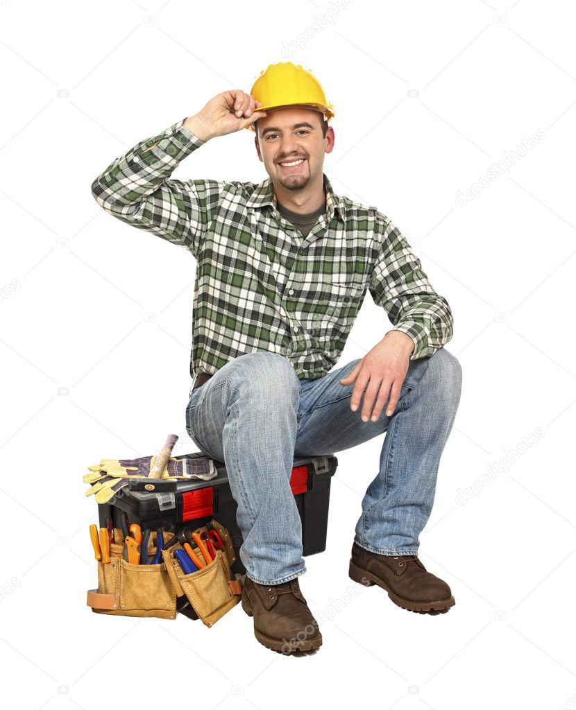 Happy worker on toolbox