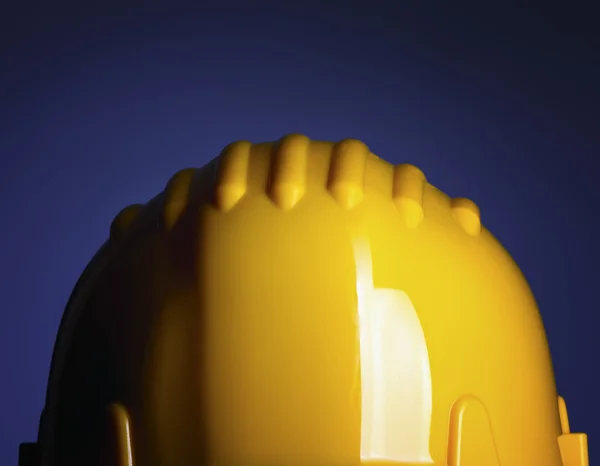Yellow handyman's helmet — Stock Photo, Image
