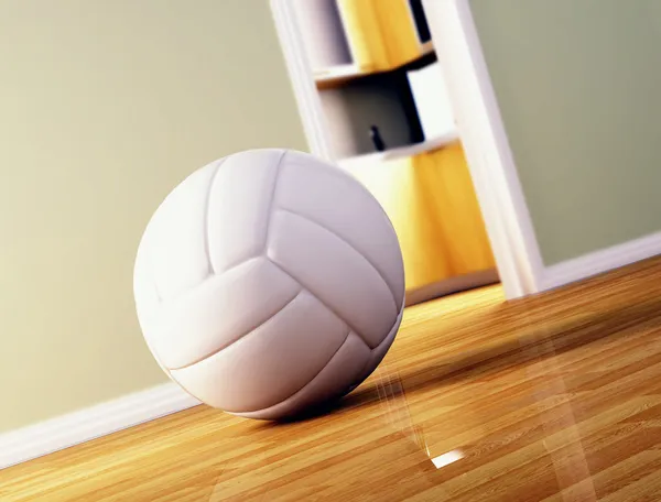 Мяч для волейбола на деревянном полу — стоковое фото