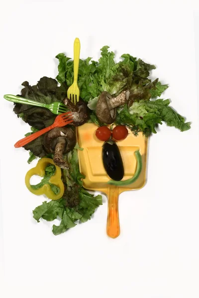 Maulkorb aus Pilzen und Salat — Stockfoto