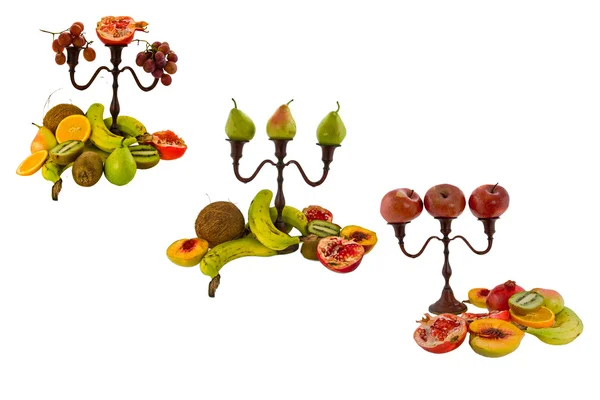 Candlesticks and fruit — Stock Photo, Image