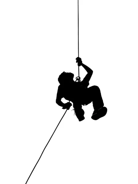 Silhouette of Person Abseiling — Stock Photo, Image