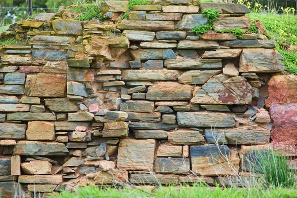 Muro di mattoni di pietra — Foto Stock