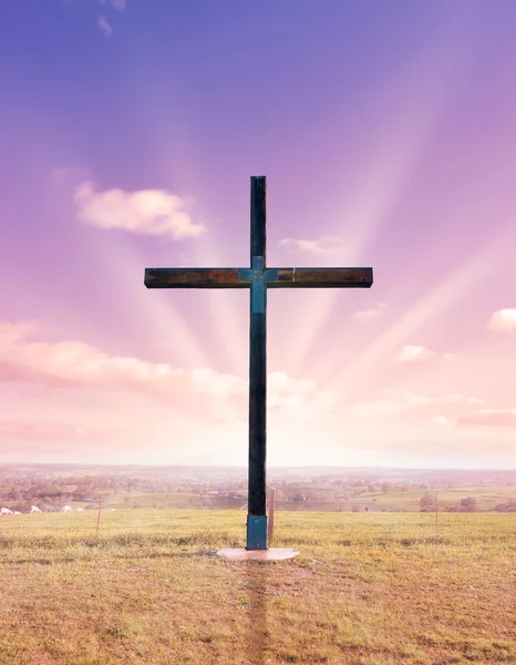 Cross of christ at sunset or sunrise — Stock Photo, Image