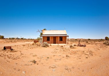 Old house in the desert clipart