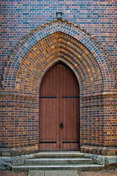 Arched church door — Stock Photo, Image