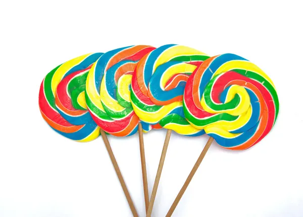 Four lollipops on white background — Stock Photo, Image
