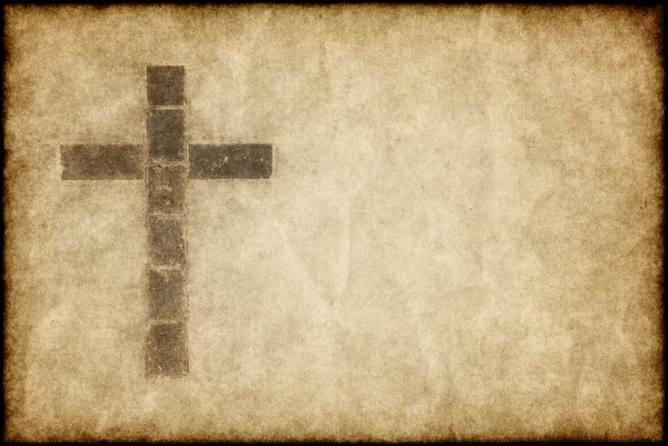 Christliches Kreuz auf Pergament — Stockfoto