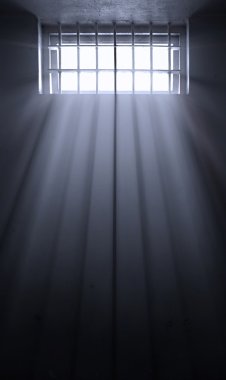 Sun rays in dark prison cell clipart