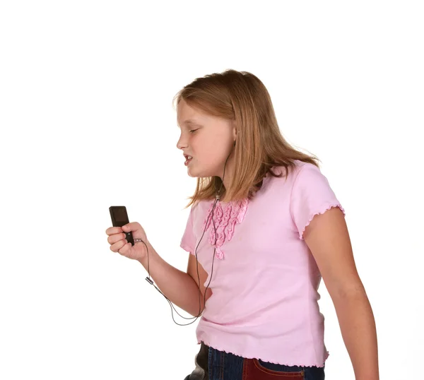 Young girl singing dancing with mp3 — Stock Photo, Image