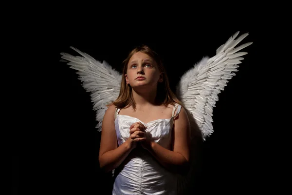 stock image Little angel girl at night