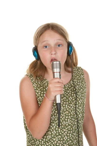 Chica joven cantando aislado en blanco —  Fotos de Stock