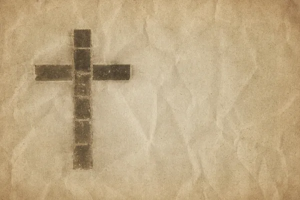 Christliches Kreuz auf Pergament — Stockfoto