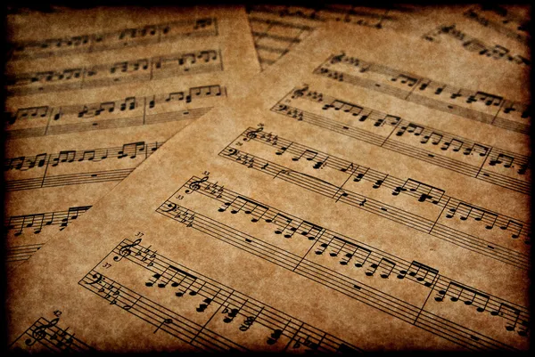 Notas musicais sobre pergaminho — Fotografia de Stock