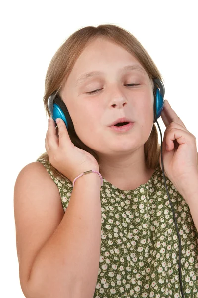 Νεαρό κορίτσι τραγουδώντας απομονωθεί σε λευκό — Φωτογραφία Αρχείου