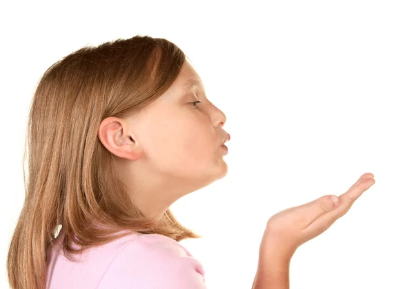 A young girl blowing a kiss — Stock Photo, Image