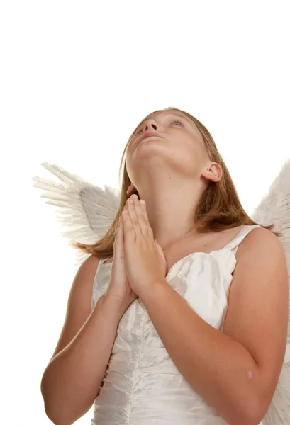 Девочка-ангел молится — стоковое фото