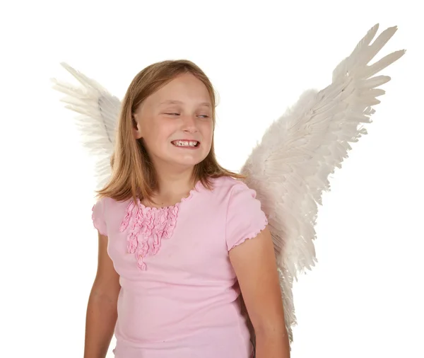 Sprytne młoda dziewczyna ze skrzydłami anioła — Zdjęcie stockowe