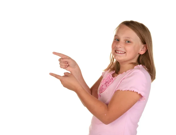 Young girl pointing on white — Stock Photo, Image