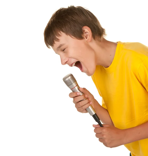 Мальчик с микрофоном на белом — стоковое фото