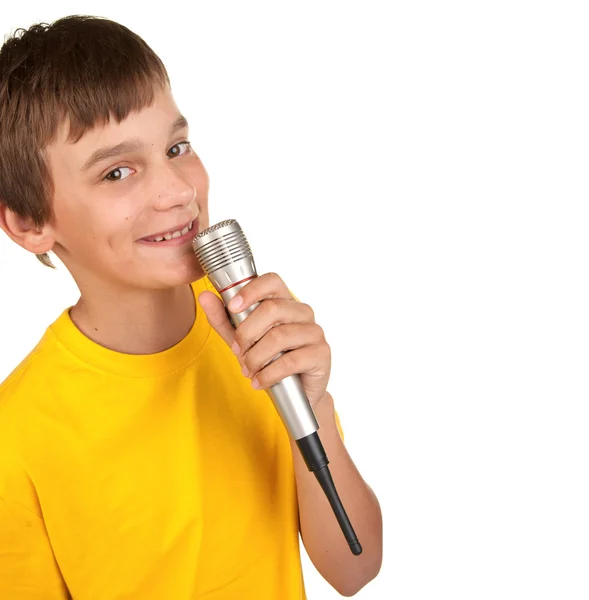 Хлопчик з мікрофоном на білому — стокове фото