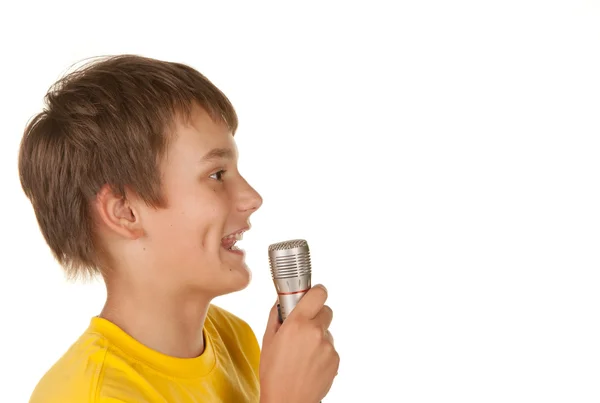 Jongen met microfoon op wit — Stockfoto