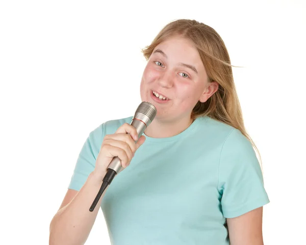 Teenage girl singing karaoke — Stock Photo, Image