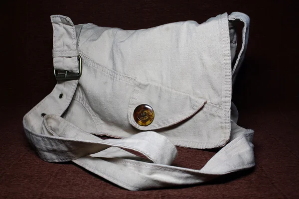 Vrouwelijke tas van grijze kleur — Stockfoto