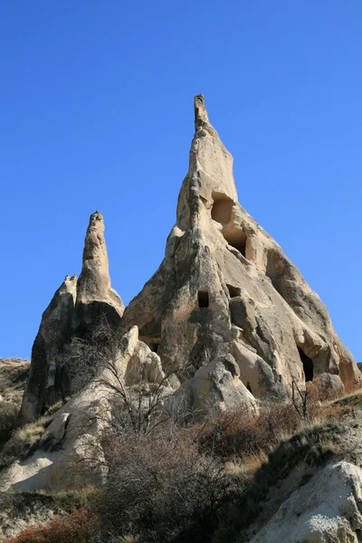 Grutas de tufo, Goreme, Cappadokia, Turquia — Fotografia de Stock
