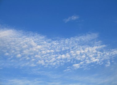 zon door wolkenGüneş bulutların üzerinden