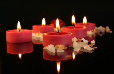 Aromatic candles in the dark clipart